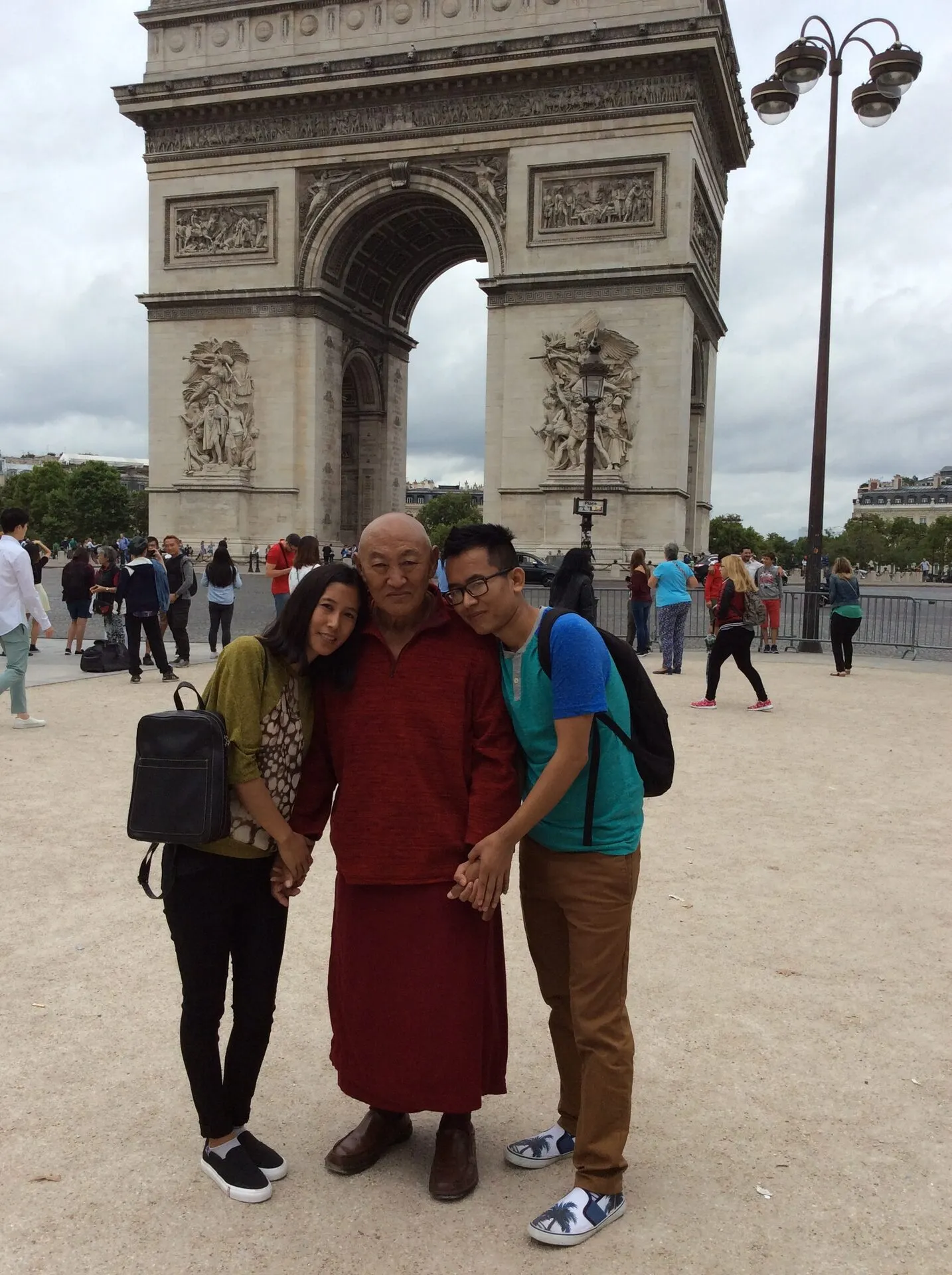 The founder with sponsors at the Arc de Triomphe in Paris